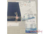 Partecipazione con tasca blu e stella marina F1758